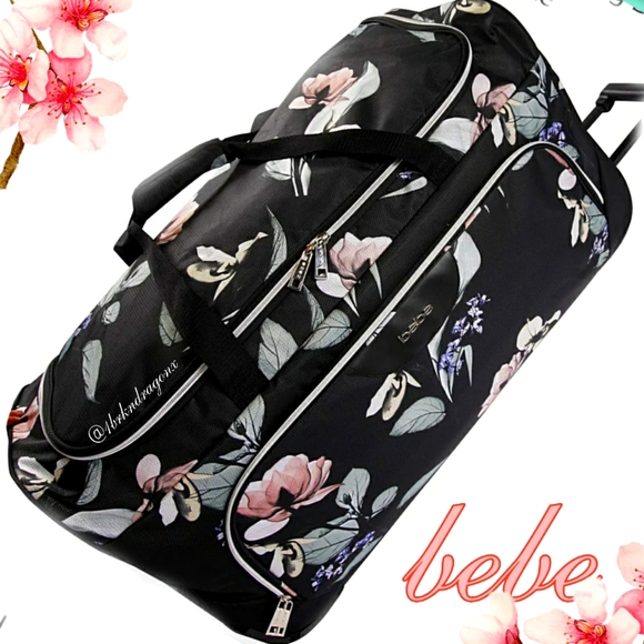bebe Bags Nwt Rolling Duffle Airline Approved Black Floral Gliding Duffel Travel Bag Poshmark